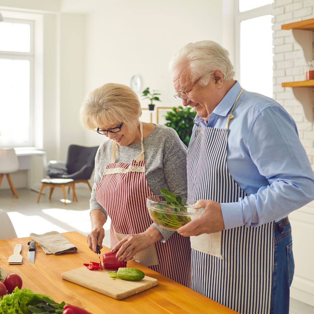 older couple cooking older couple cooking