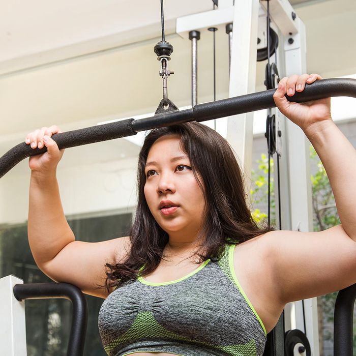 woman exercising at the gym