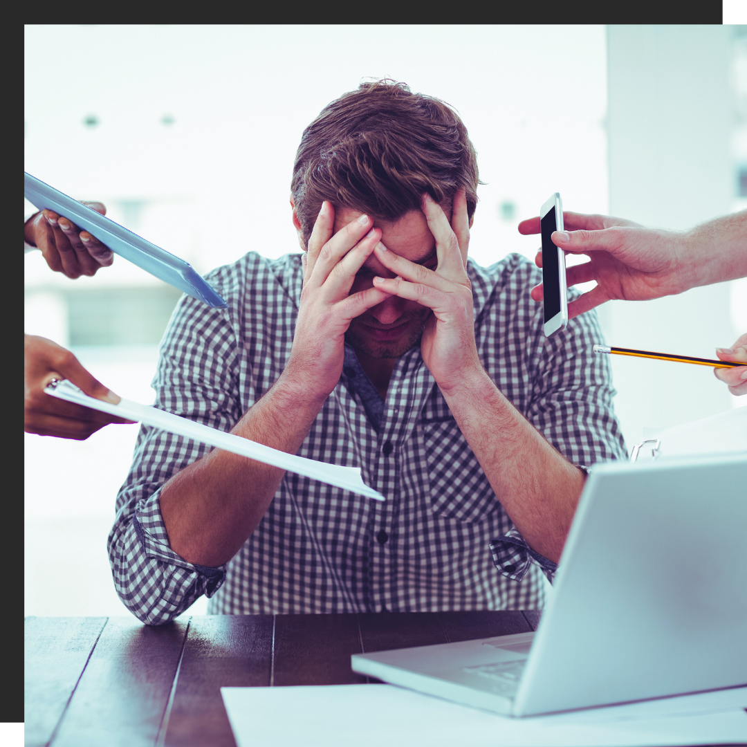 man stressed at work