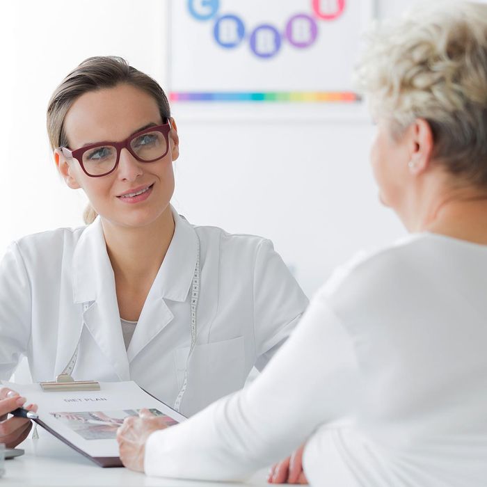 woman talking to health care provider