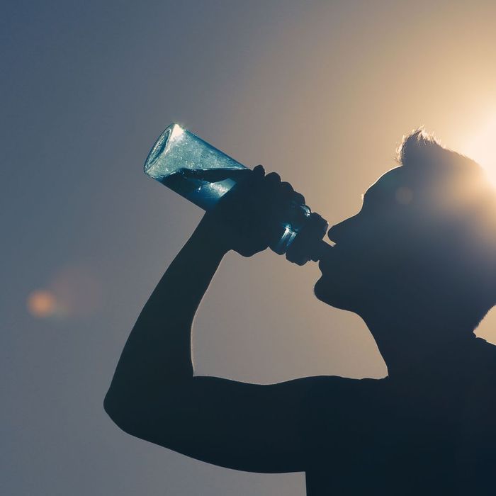 man drinking water 