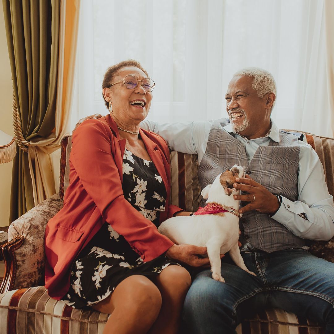 older couple sitting on the couch