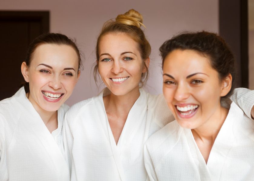 ladies smile while in spa robes dreamstime_xxl_61812618.jpg