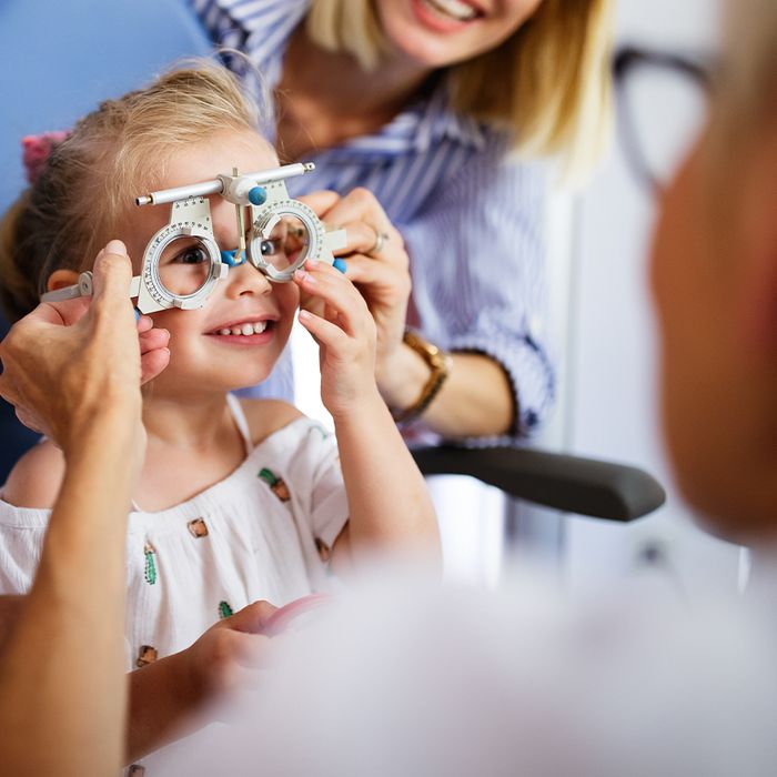 eye exam on young girl