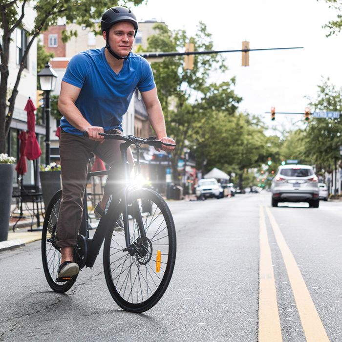 man biking in city