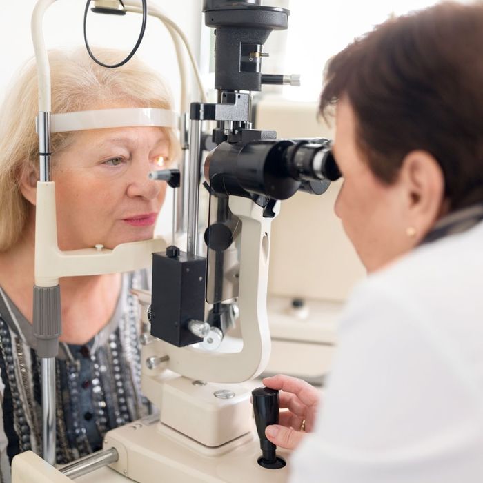 Woman receiving an Eye exam