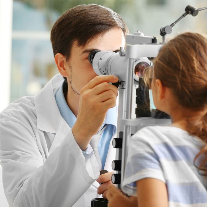 doctor performing eye exam