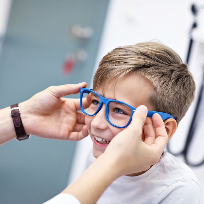 boy getting new glasses