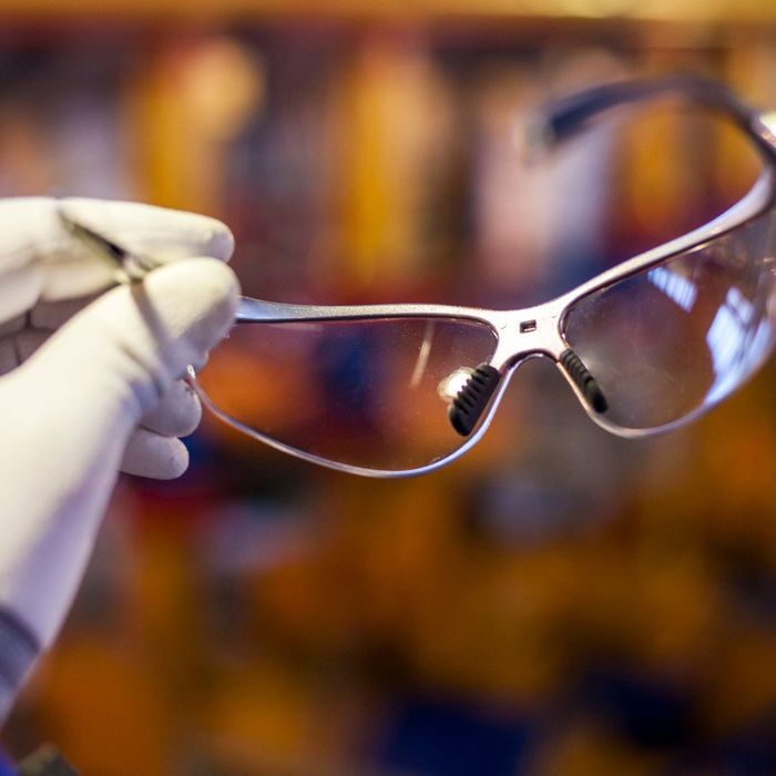 AA person holding safety glasses
