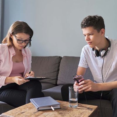 teenage boy in therapy session