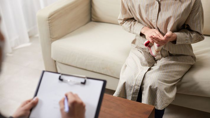 Counseling sessions and person is knitting