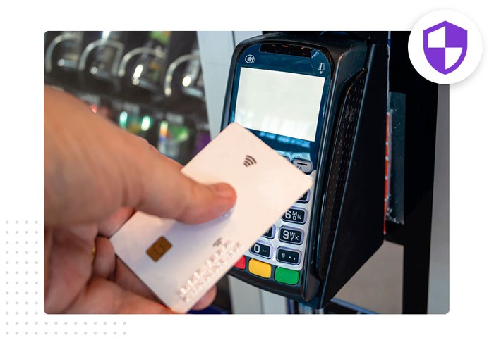holding credit card up to vending machine card reader