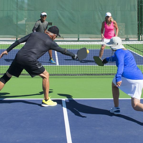 Group playing pickleball