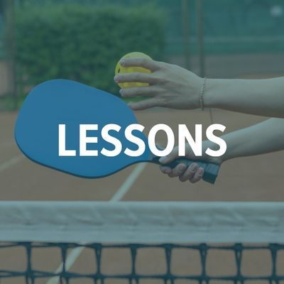 Hands serving a pickleball and preparing to hit it with a paddle