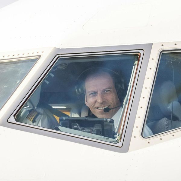 A pilot looking out of a window