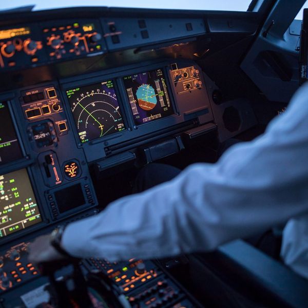 A woman practicing pilot skills. A woman practicing pilot skills.