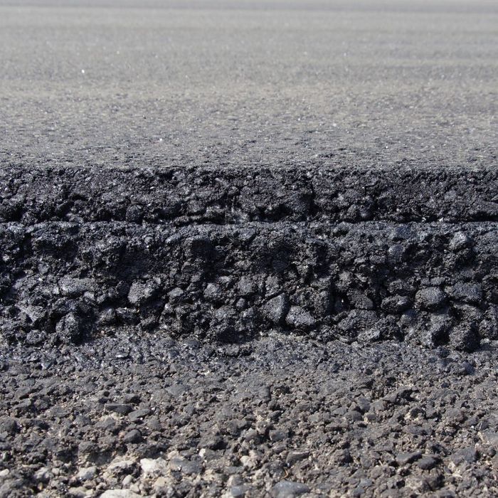 Cross-section of a freshly overlayed paved asphalt