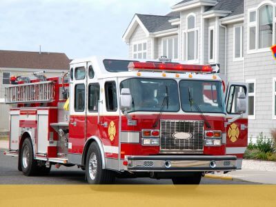 Fire truck in front of house