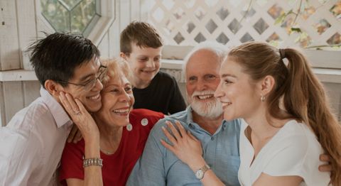 multi-generational family smiling together