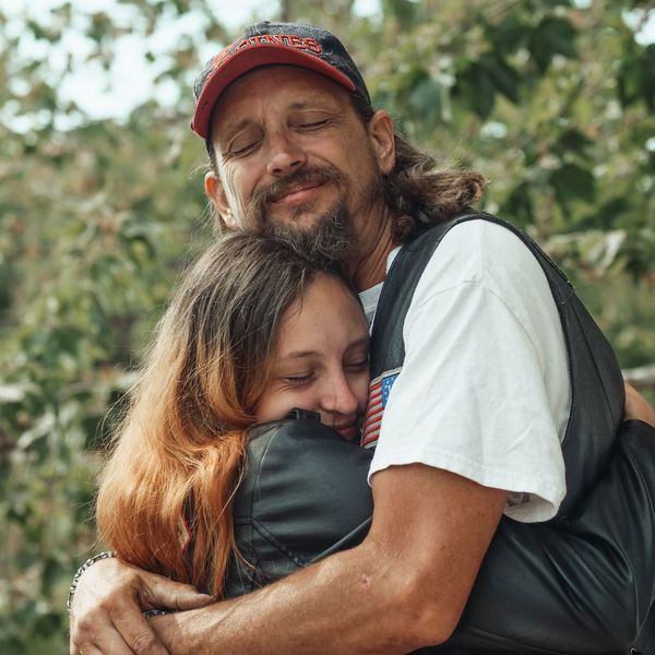 father and daughter hugging