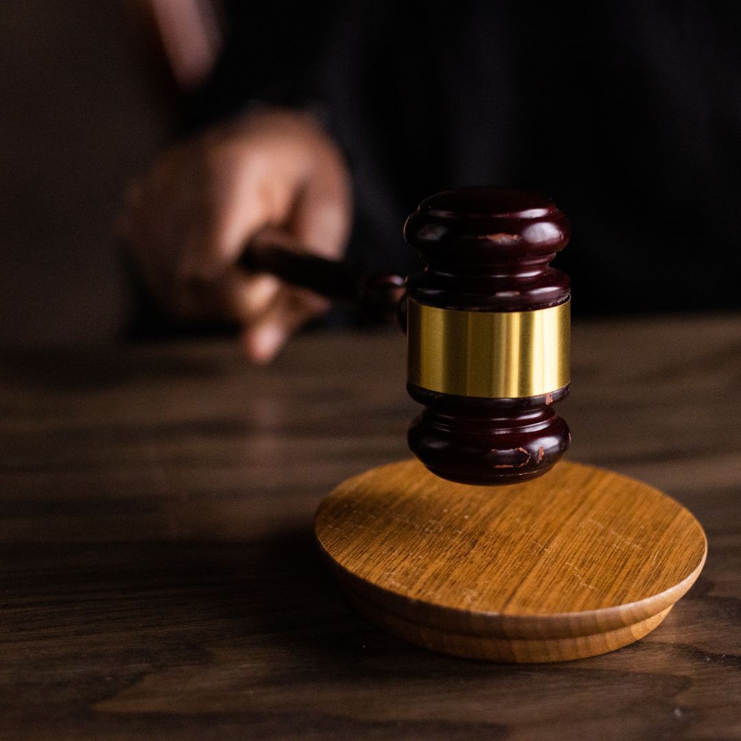 hand on gavel about to strike