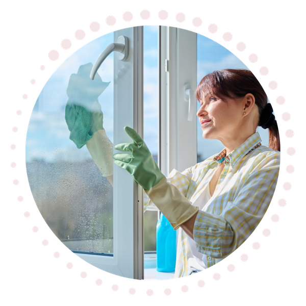 Woman cleaning a window