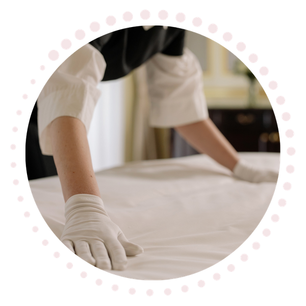 Maid making a bed