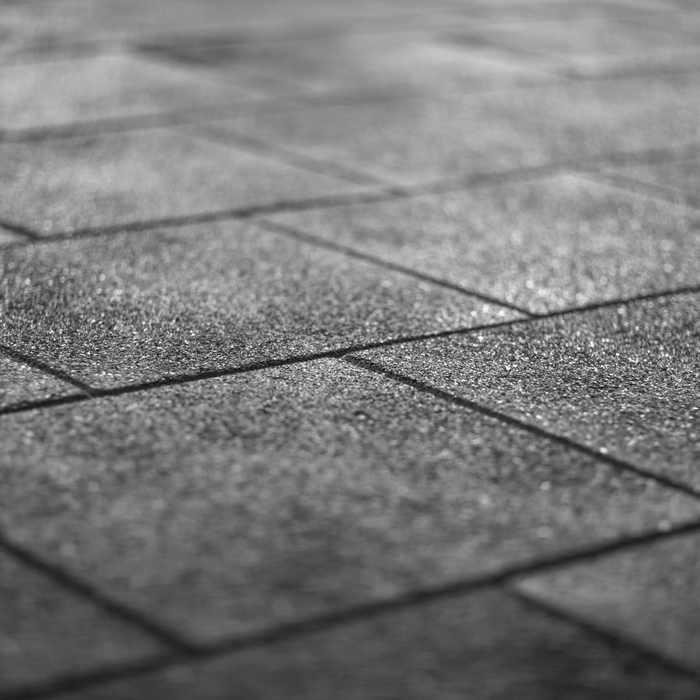 Squares of rubber flooring. 