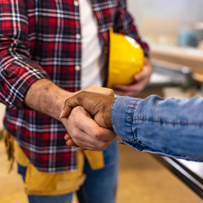 shaking hands with contractor