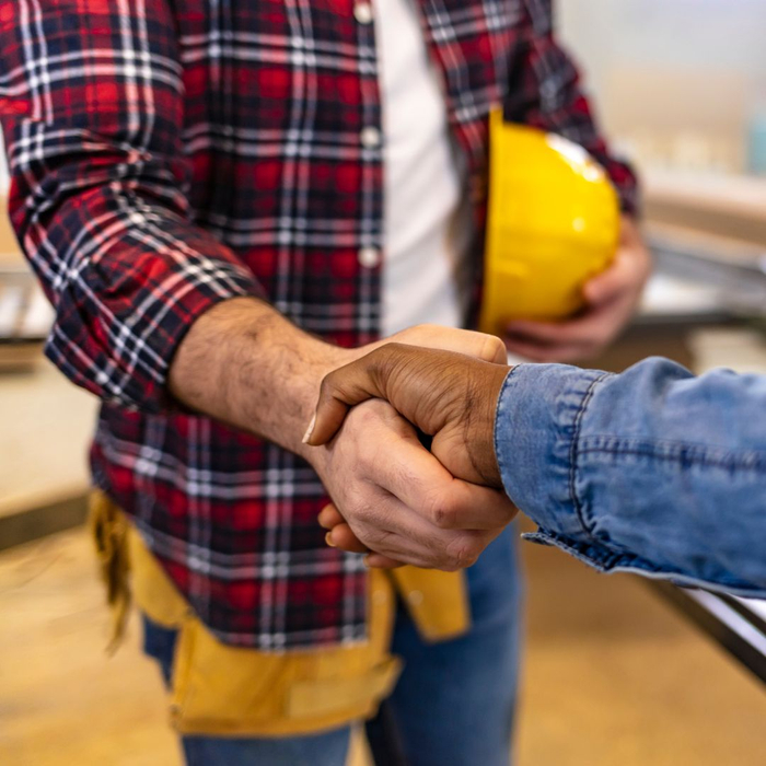 commercial flooring contractor shaking hands