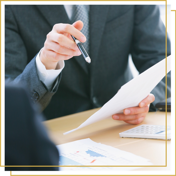 looking over financial documents