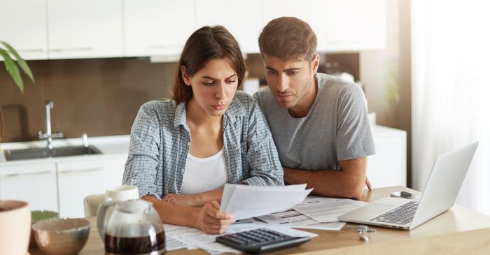 image of a couple looking at an estimate