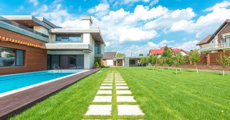 house with green lawn
