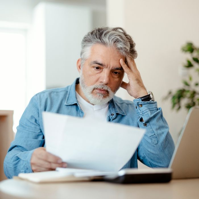 image of man looking at a high estimate