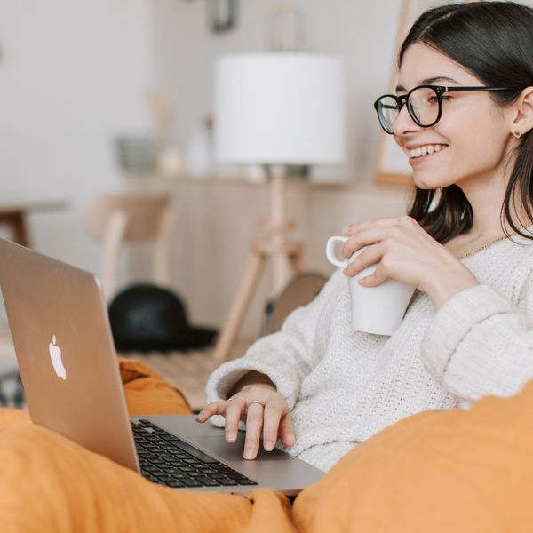 woman using laptop for online one-on-one session