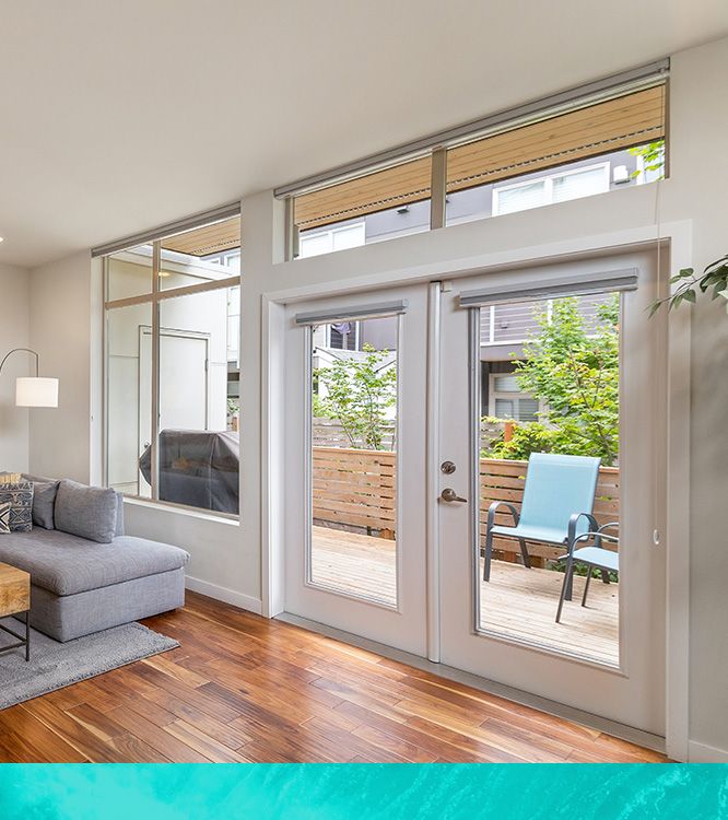 French doors leading to a home's backyard