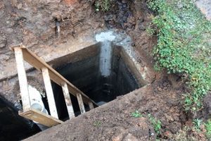 Ladder in sewer drain Ladder in sewer drain