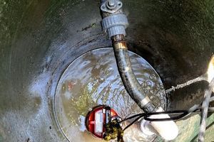 Looking into sewage repair drain Looking into sewage repair drain