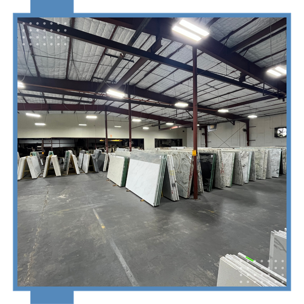Stone slabs propped up in a showroom