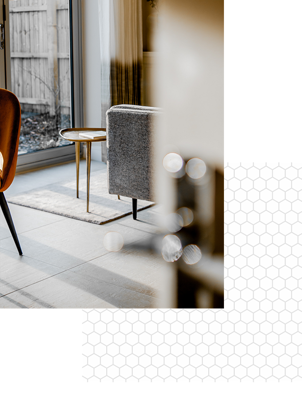 A living room floor with tiles and modern decor