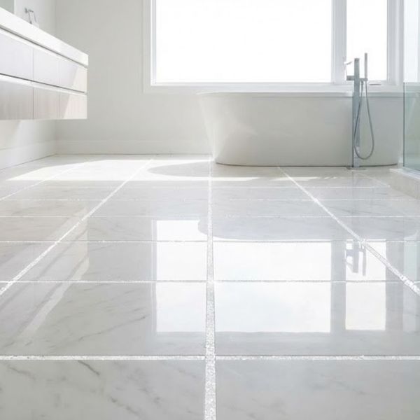 A brightly lit, clean bathroom floor