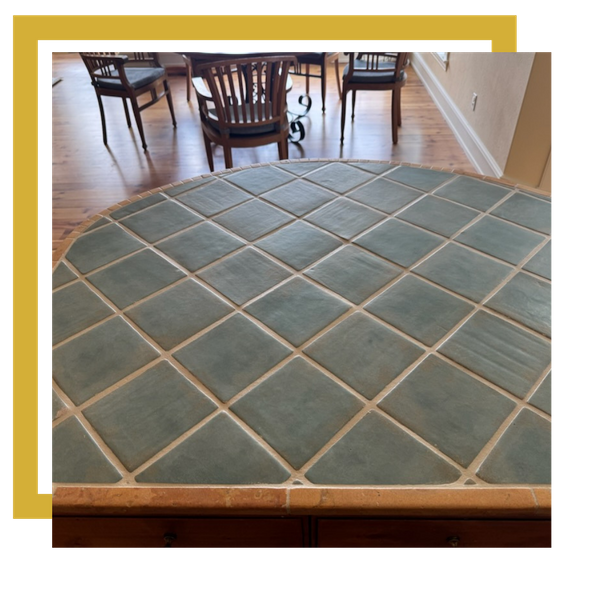 Tiled counter in dining area with color-sealed grout