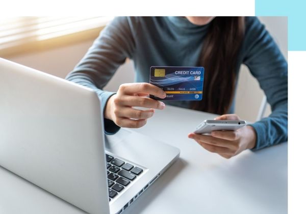 woman paying online with credit card