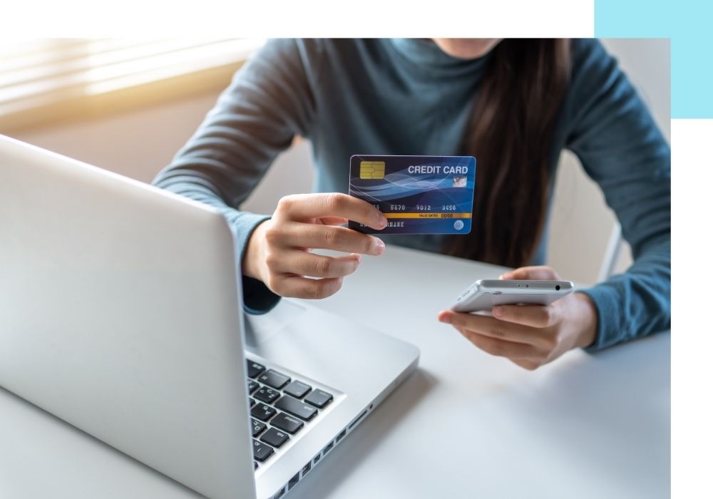 woman paying online with credit card woman paying online with credit card