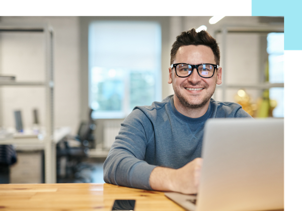 smiling man on laptop smiling man on laptop