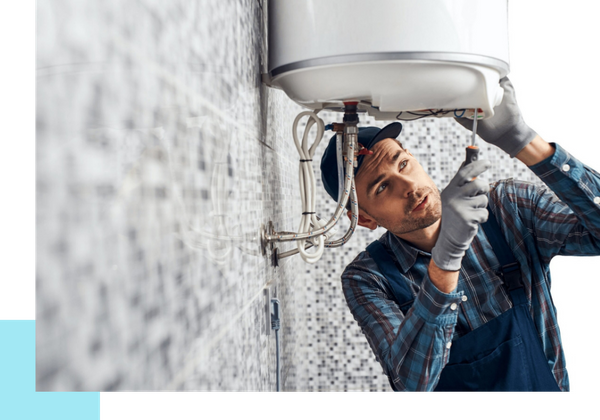 plumber working underneath a sink