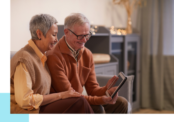 older couple looking at tablet older couple looking at tablet