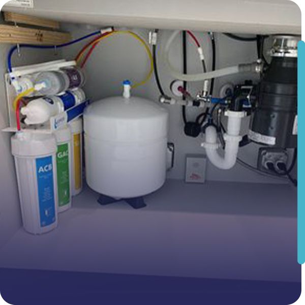 a reverse osmosis system set up under a sink