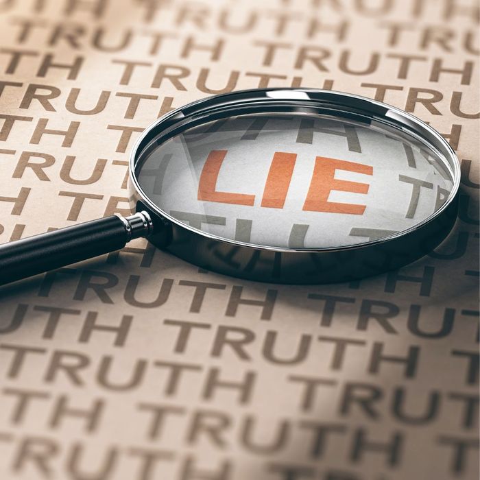 magnifying glass over the word lie