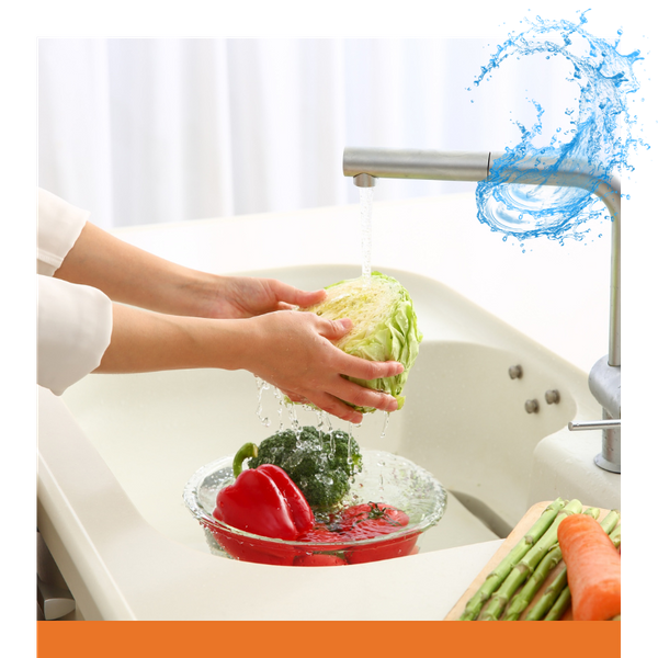 person washing vegetables
